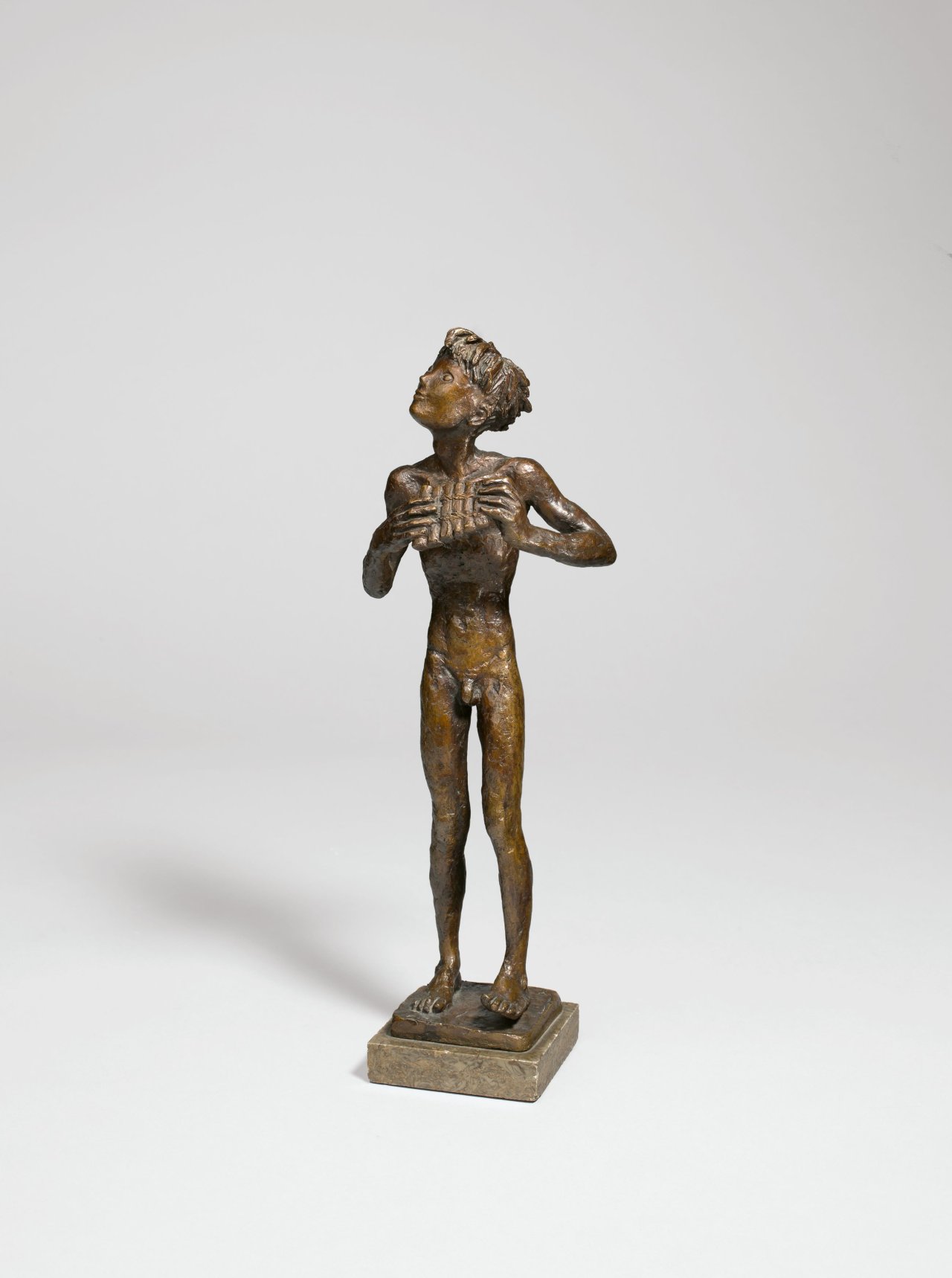 This picture shows the following artwork: Renée Sintenis. ”Junge mit Panflöte”. 1950.