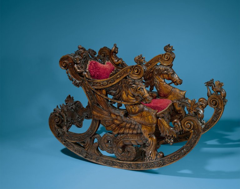 Auf diesem Bild ist das folgende Kunstwerk zu sehen:  Venezianisch. Schaukelstuhl. Um 1860.