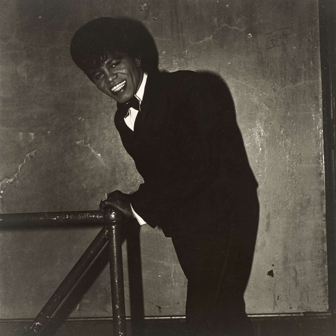 This picture shows the following artwork: Diane Arbus. James Brown backstage at the Apollo Theater, N.Y.C. 1966.