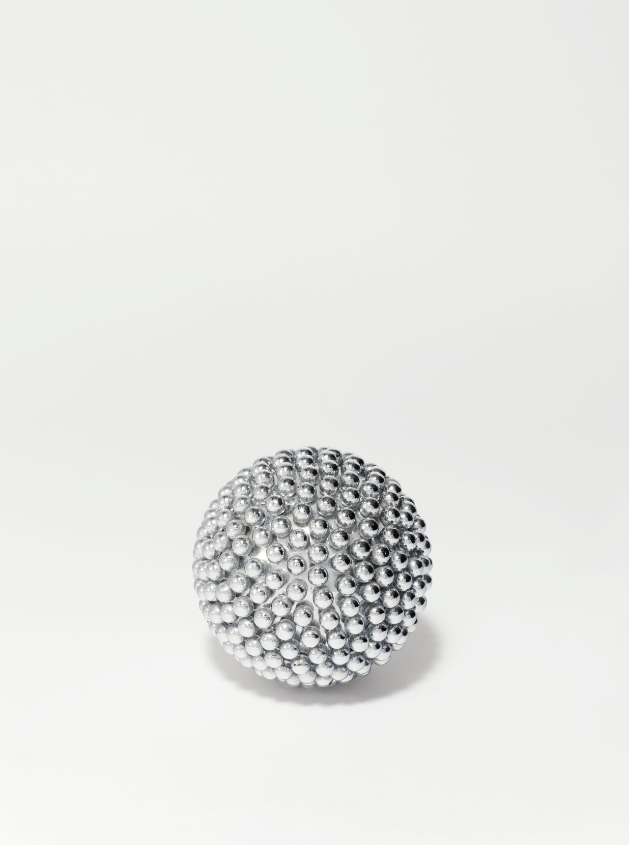 This picture shows the following artwork: Otto Piene. Chrome sphere. 1966.