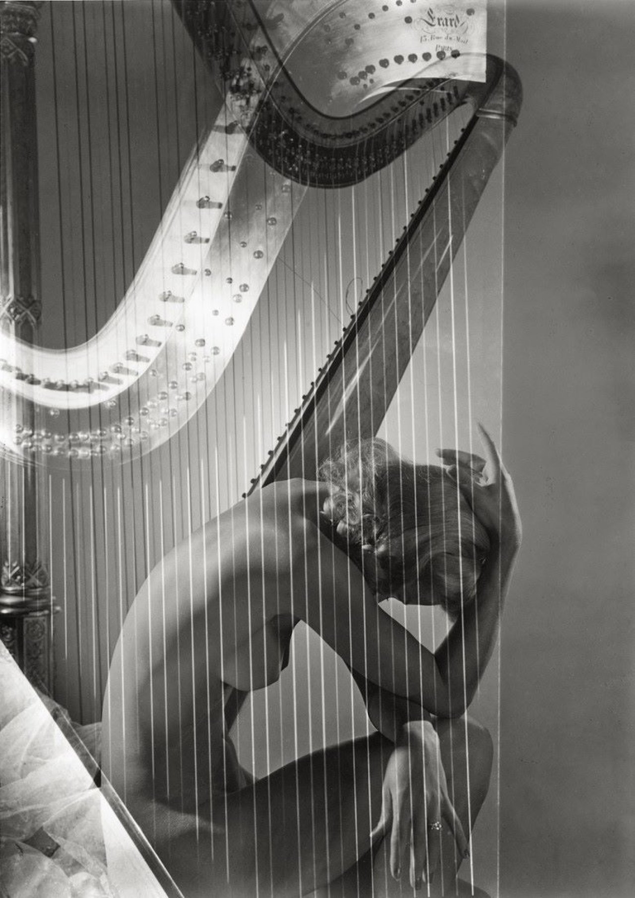 This picture shows the following artwork: Horst P. Horst (i.e. Horst Paul Albert Bohrmann). Lisa with Harp, Paris. 1939.
