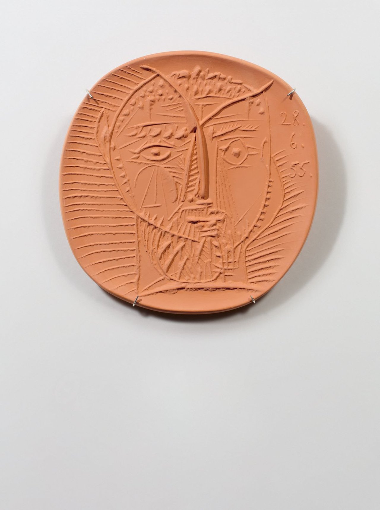 Auf diesem Bild ist das folgende Kunstwerk zu sehen: Pablo Picasso. „Visage de Faune“. 1955.