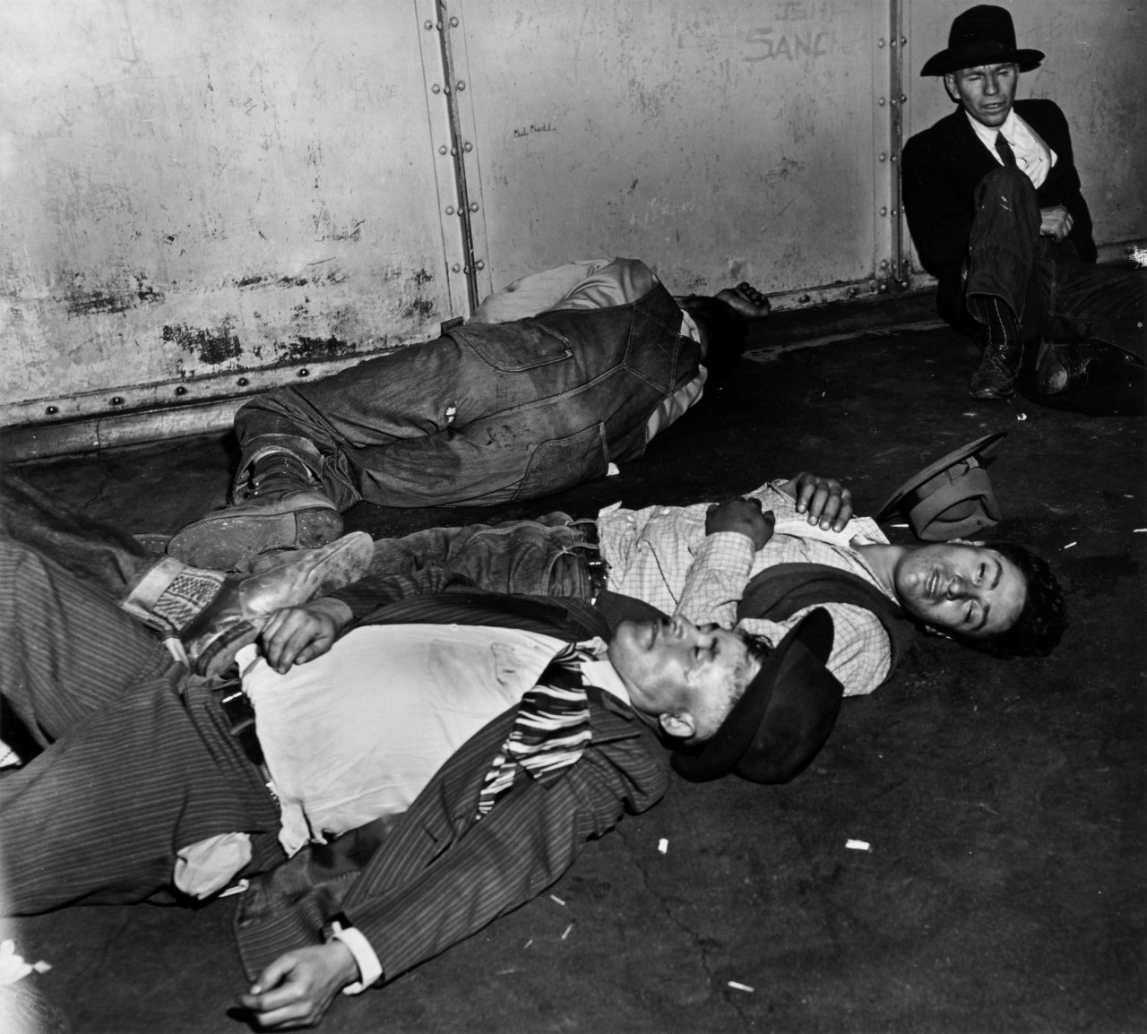 This picture shows the following artwork:  Weegee (i.e. Fellig, Arthur H.). Cooler (detention cell). Circa 1942.