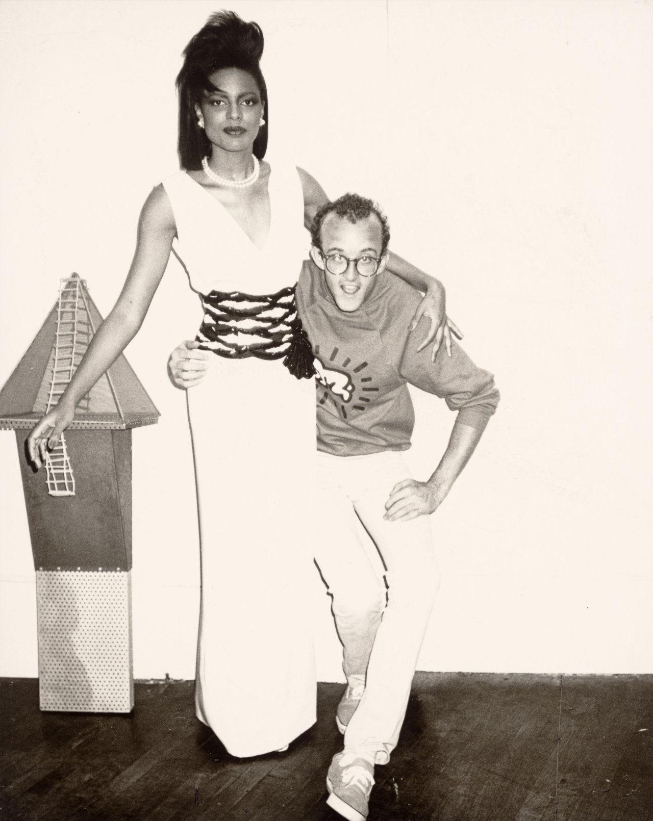 This picture shows the following artwork: Andy Warhol. Keith Haring and model Wanakee Pugh. 1984.