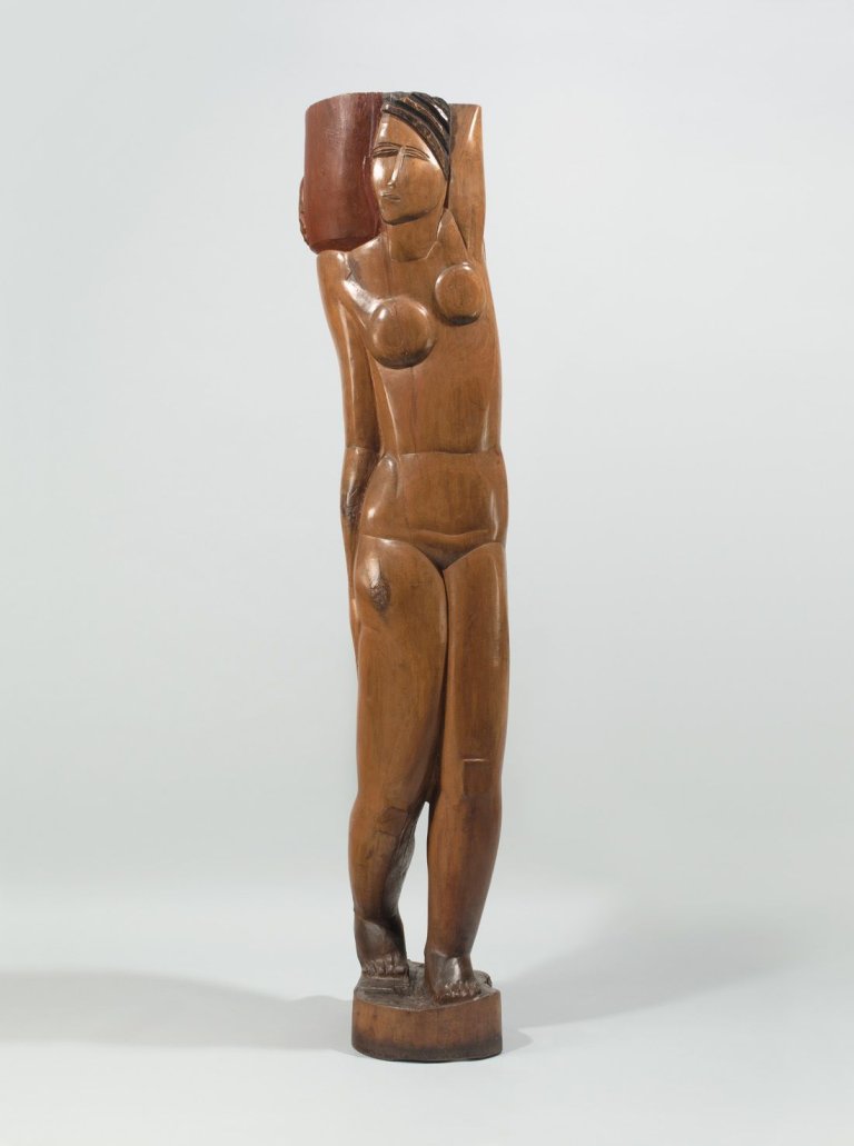 Auf diesem Bild ist das folgende Kunstwerk zu sehen: Ossip Zadkine. „Jeune fille à la cruche“ (auch: Die Wasserträgerin, Junges Mädchen mit Krug). 1920.