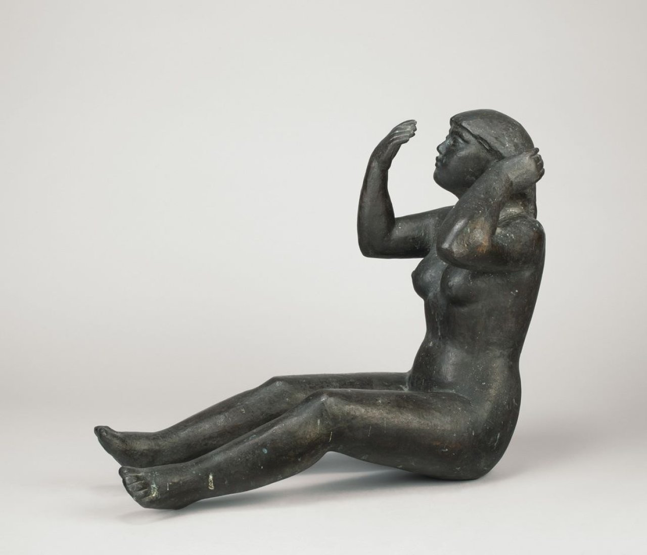 Auf diesem Bild ist das folgende Kunstwerk zu sehen: Gustav Seitz. „Mädchen mit Spiegel “. 1947.