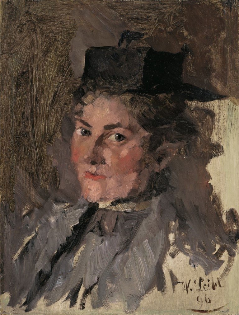 Auf diesem Bild ist das folgende Kunstwerk zu sehen: Wilhelm Leibl. „Studienkopf einer jungen Dame mit flachem Hut (Bildnis Felicia Kirchdorffer)“. 1896.