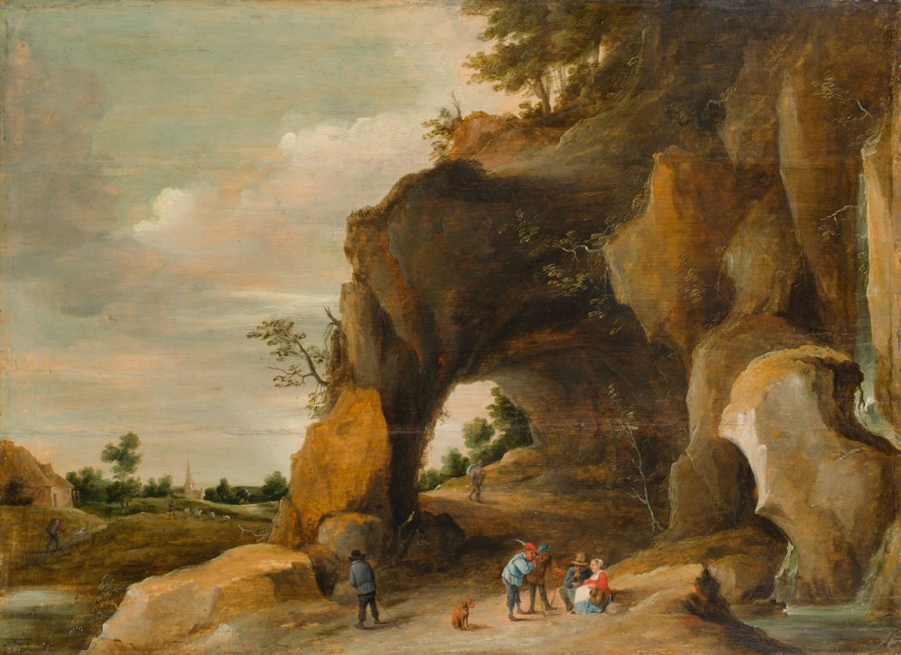 Auf diesem Bild ist das folgende Kunstwerk zu sehen: Werkstatt des David Teniers d.J.. Landstraße mit Felsentor. Um 1670.