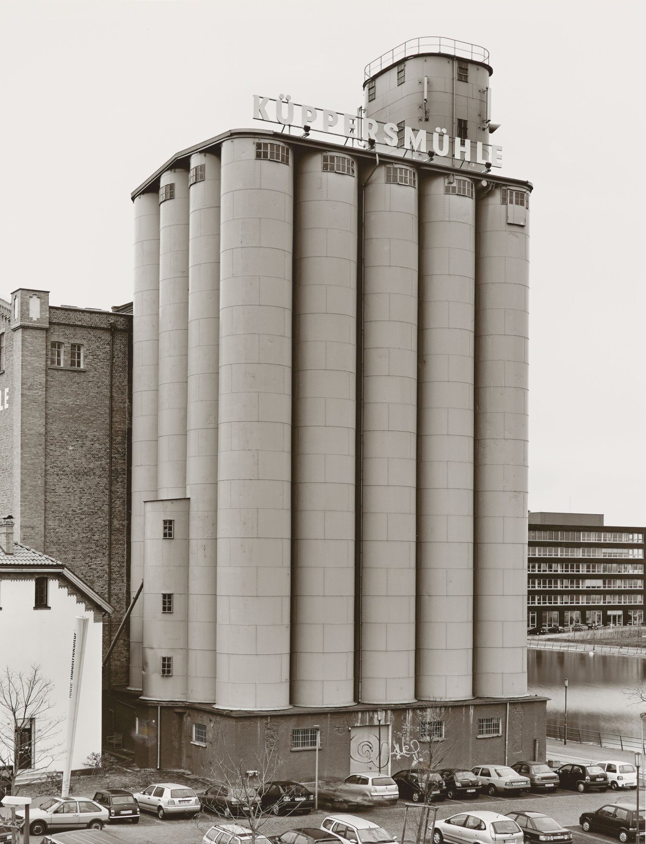 This picture shows the following artwork: Bernd and Hilla Becher (Siegen 1931 - 2007 Rostock / Potsdam 1934 - 2015 Düsseldorf). ”GRAIN ELEVATOR DUISBURG, D.”. 2002.