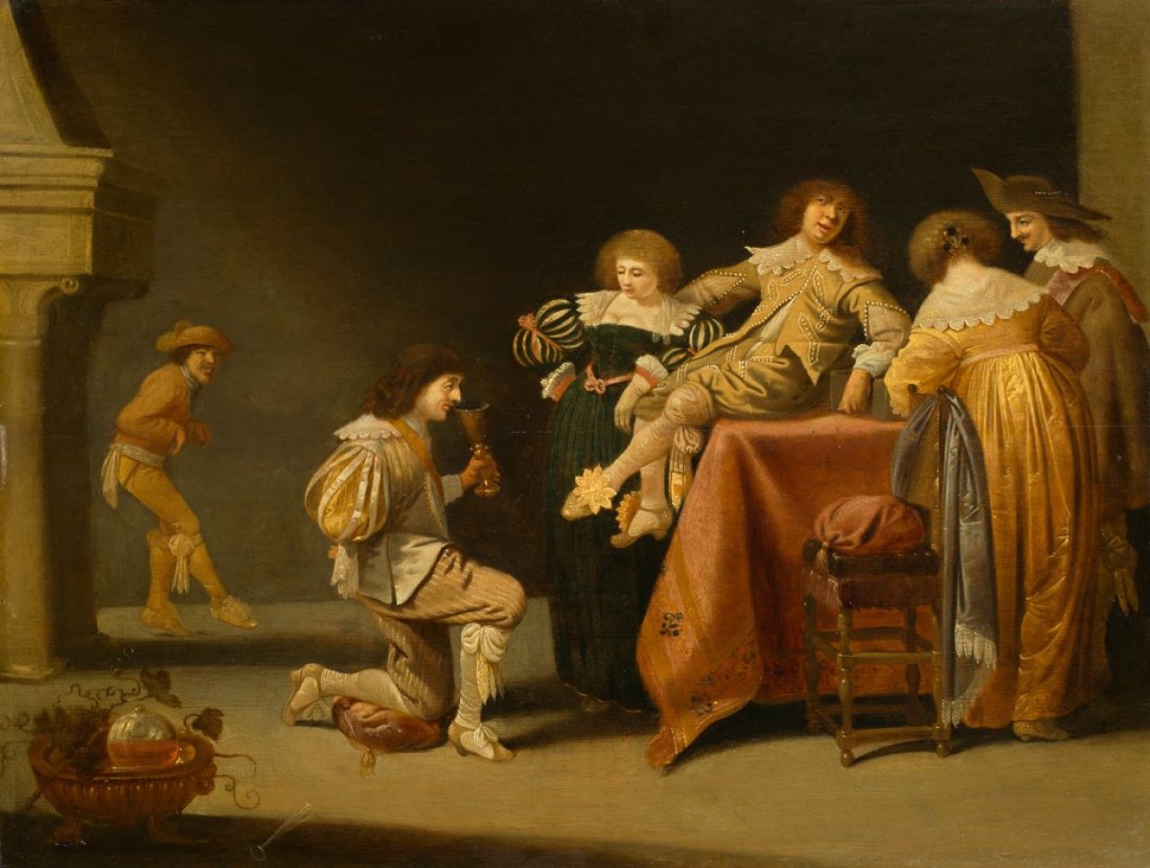 Auf diesem Bild ist das folgende Kunstwerk zu sehen: Umkreis des Pieter Jansz. Quast. Interieur mit fröhlicher Gesellschaft. Um 1620.