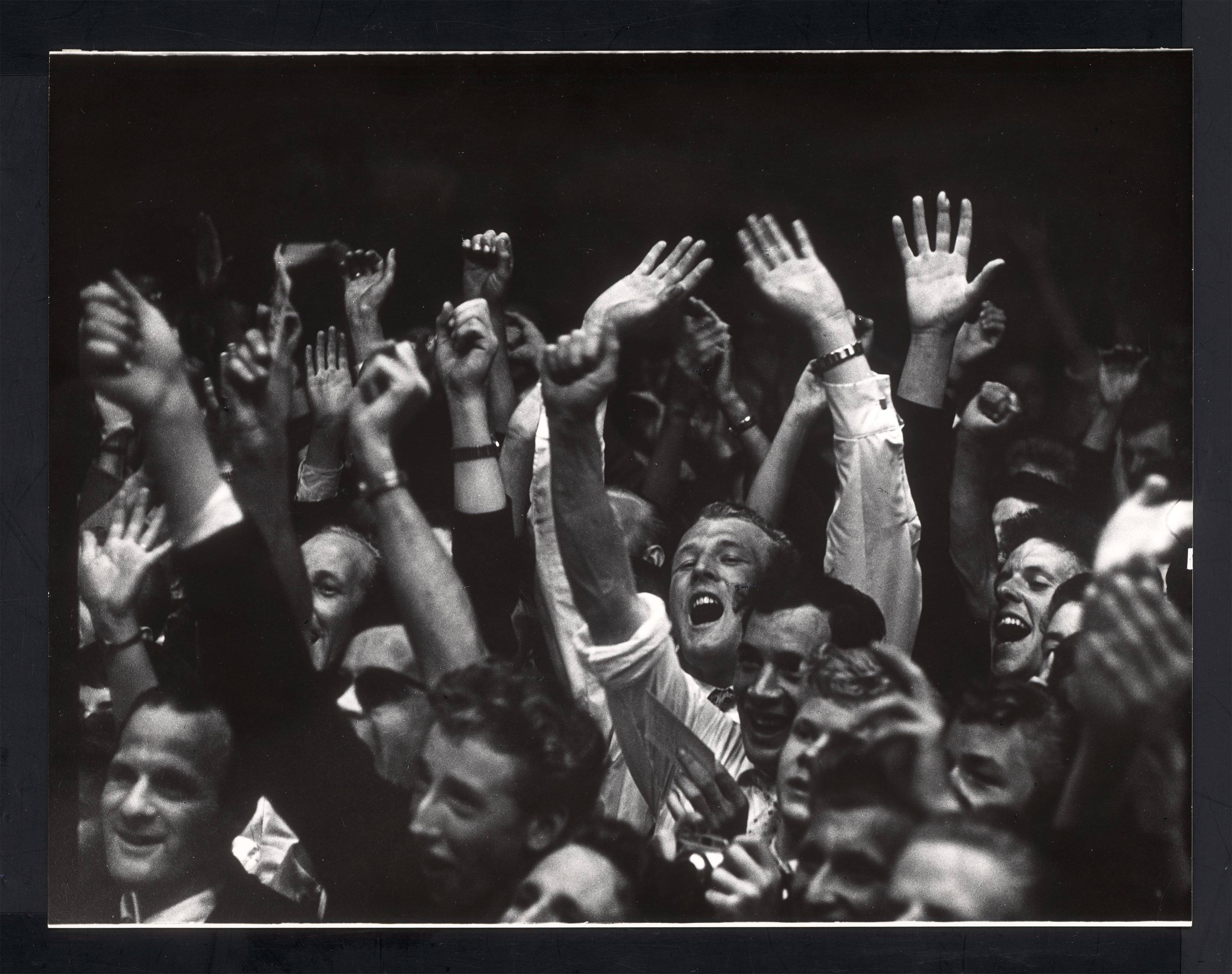 This picture shows the following artwork: Ed van der Elsken. Audience at the concert of Benny Goodman in the village Blokker, 15 May. 1958.
