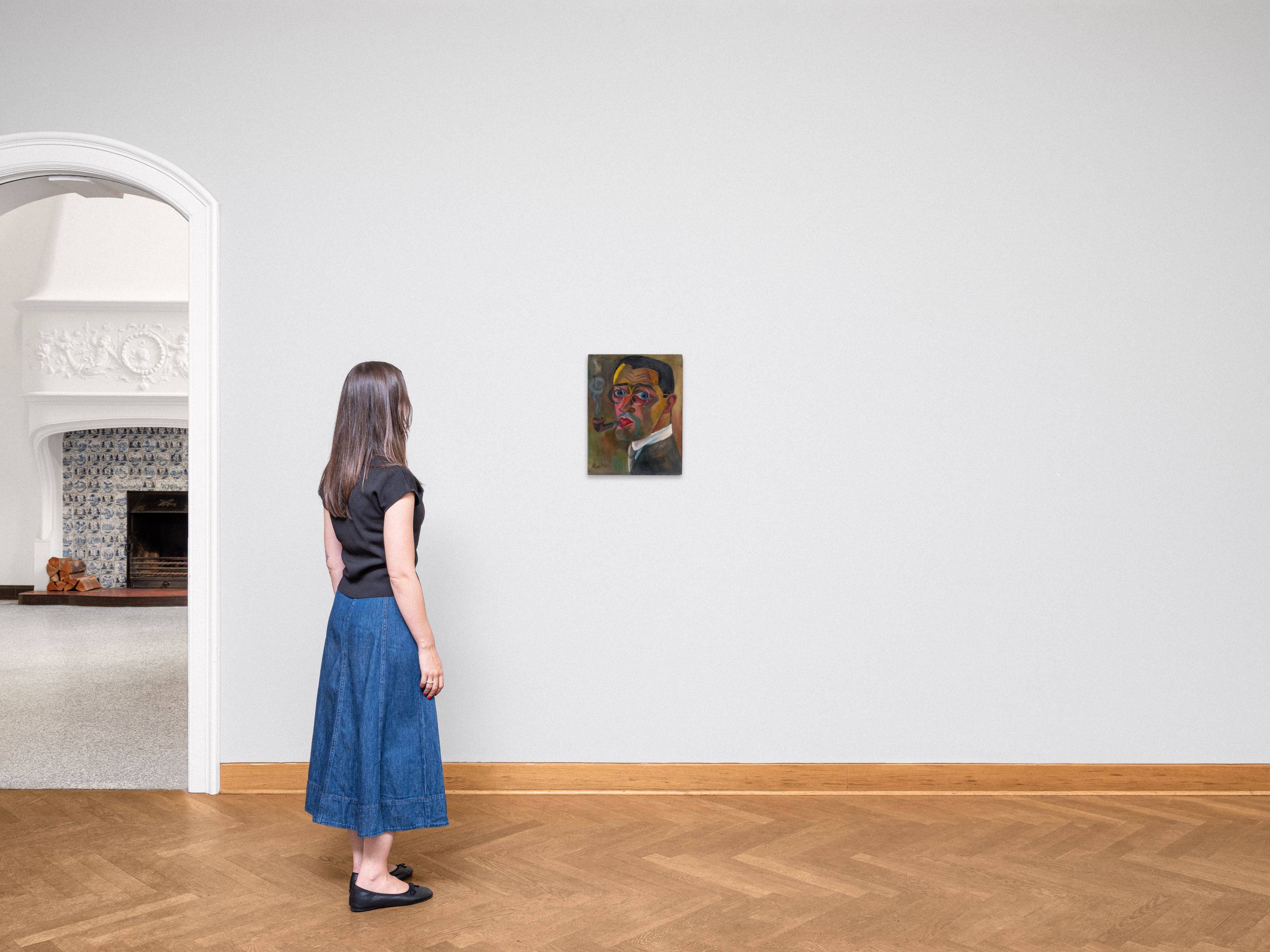 Auf diesem Bild ist das folgende Kunstwerk zu sehen: Conrad Felixmüller. „Selbstbildnis, Pfeife rauchend“. 1921.