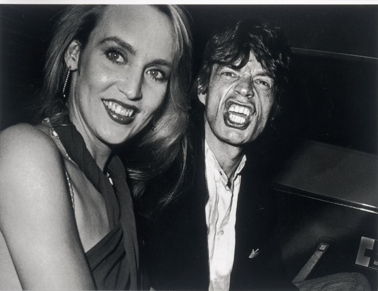 Auf diesem Bild ist das folgende Kunstwerk zu sehen: Ron Galella (d.i. Galella, Ronald E.). Mick Jagger and Jerry Hall, New York City. 1984.