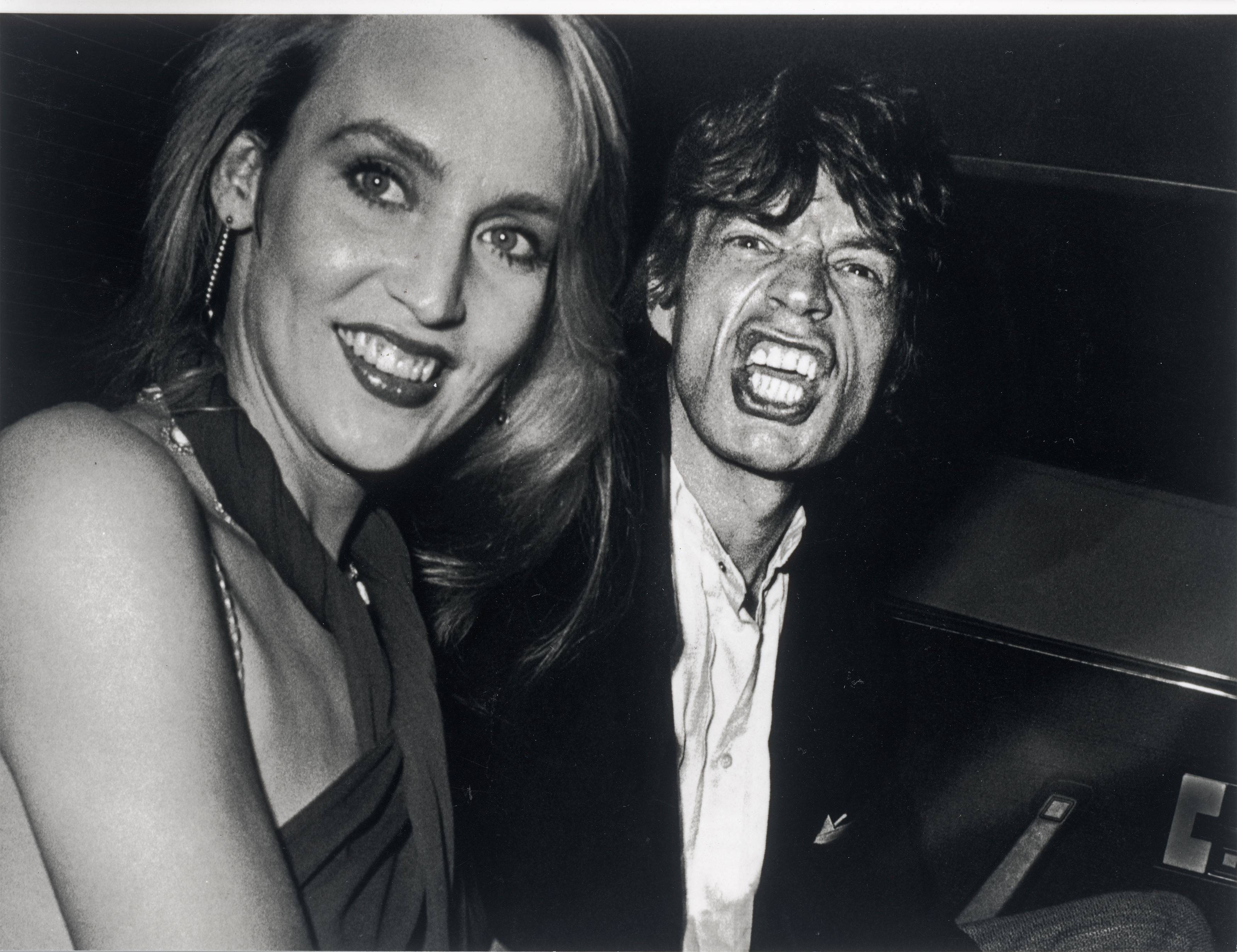 Auf diesem Bild ist das folgende Kunstwerk zu sehen: Ron Galella (d.i. Galella, Ronald E.). Mick Jagger and Jerry Hall, New York City. 1984.