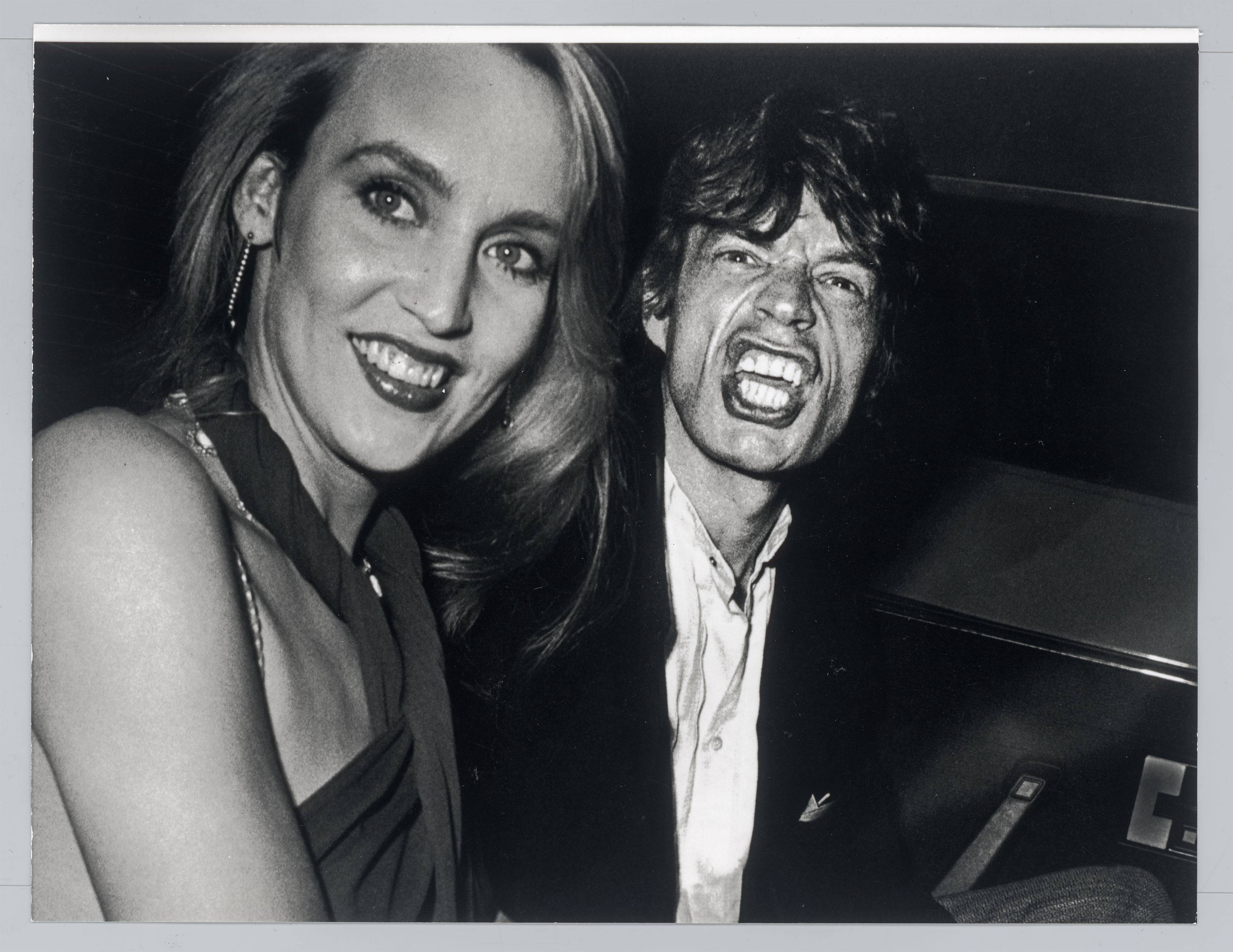 Auf diesem Bild ist das folgende Kunstwerk zu sehen: Ron Galella (d.i. Galella, Ronald E.). Mick Jagger and Jerry Hall, New York City. 1984.