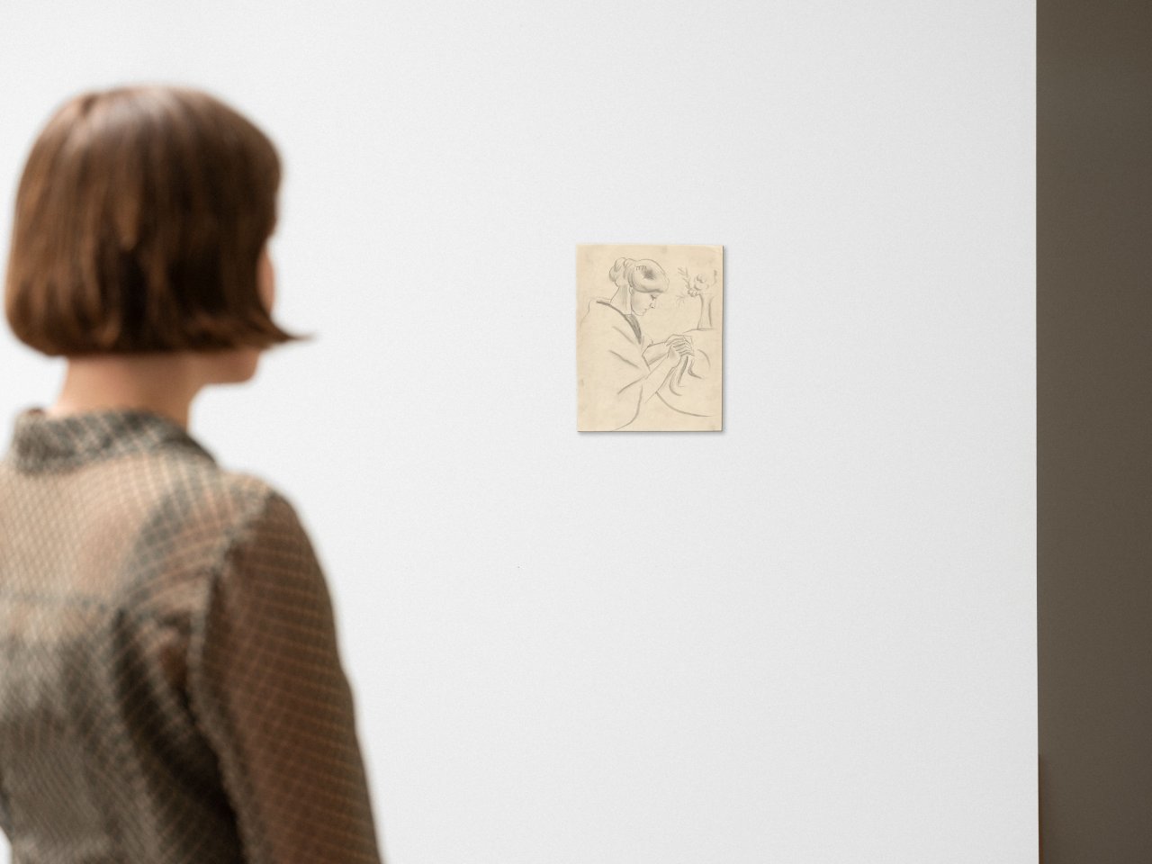 This picture shows the following artwork: August Macke. ”Nähende Frau II” (Elisabeth Macke). 1910.