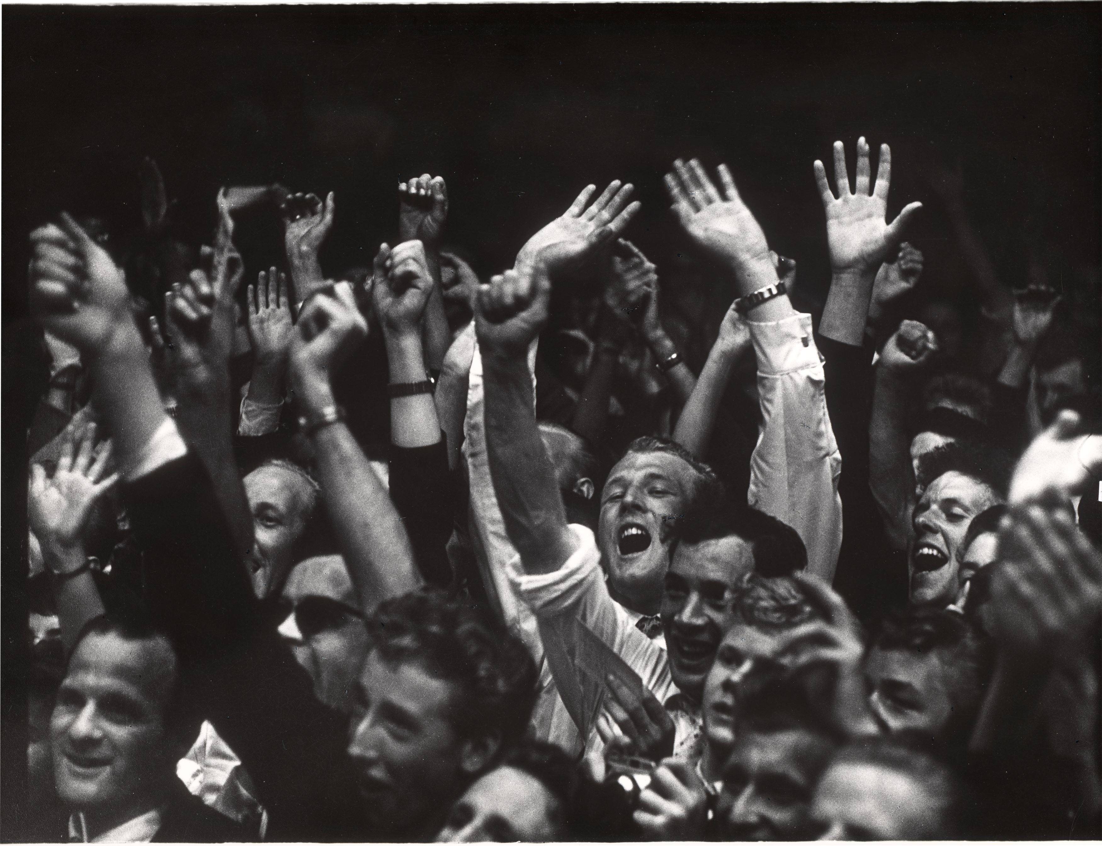 This picture shows the following artwork: Ed van der Elsken. Audience at the concert of Benny Goodman in the village Blokker, 15 May. 1958.