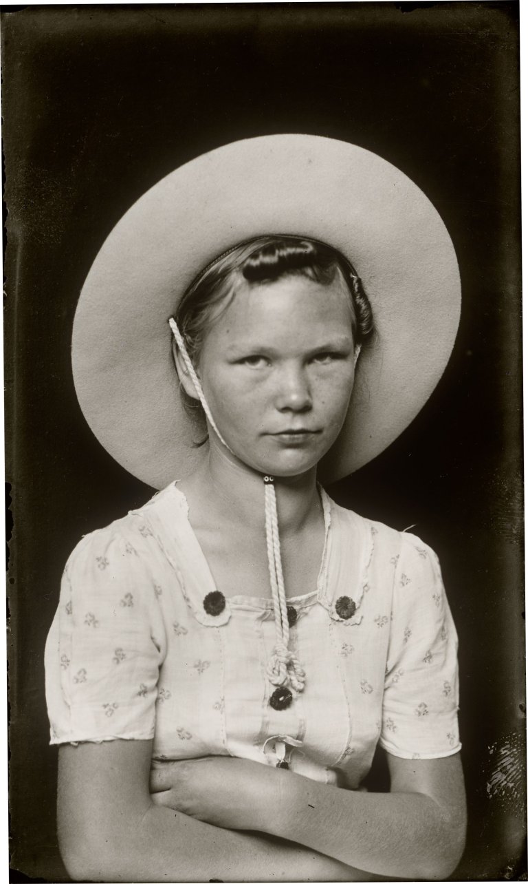 This picture shows the following artwork: Mike Disfarmer. Girl with Large Hat. 1939/1946.