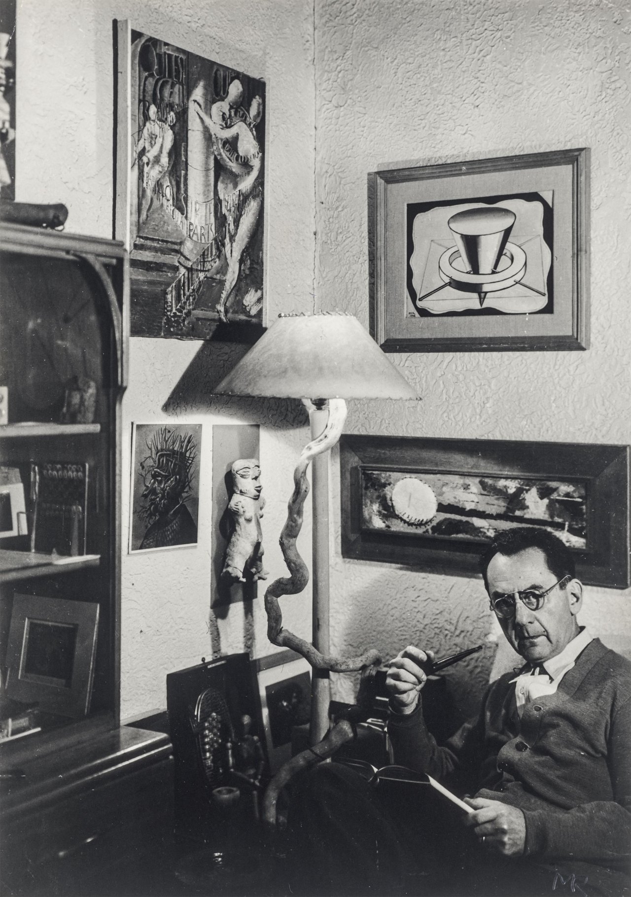 This picture shows the following artwork:  Man Ray. Man Ray in his home in Hollywood. 1948.